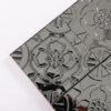 Black Embossed Patchwork Metal Mosaic Tile With Floral Patterns.