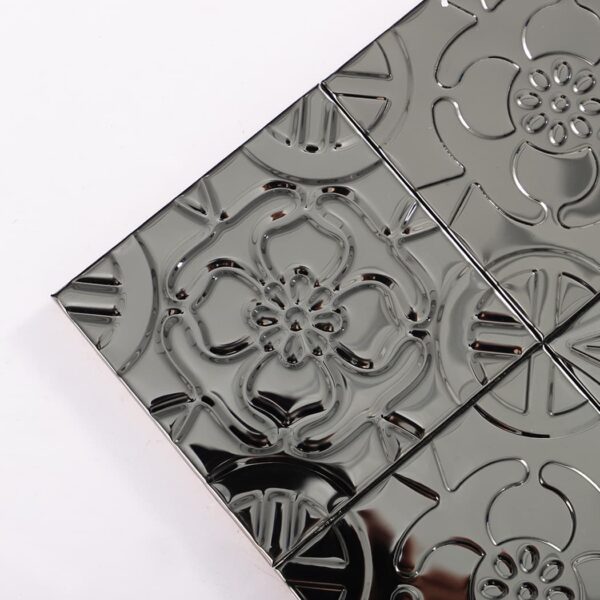 Black Embossed Patchwork Metal Mosaic Tile With Floral Patterns.