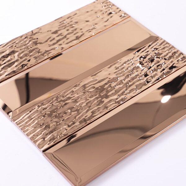 Mirror-rose-gold-stainless-steel-mosaic-tile-angled-view Mirror Rose Gold Stainless Steel Rectangle Mosaic Tile