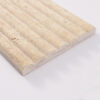 angled-edge-view-of-fluted-travertine-tile Long Beige Travertine Fluted Stone Strip Wall Tile
